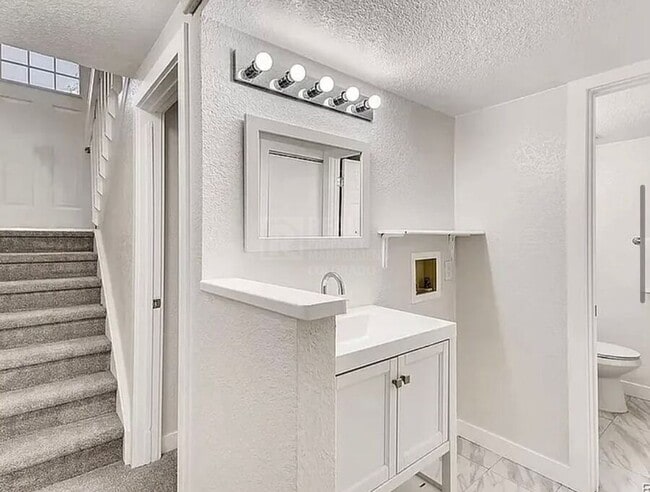 Building Photo - 7110 E 63rd Ave