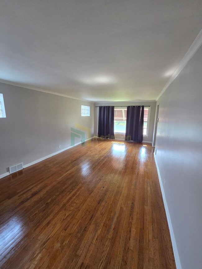 Building Photo - Beautifully Renovated 4-Bedroom Home with Finished Basement & Fenced Yard