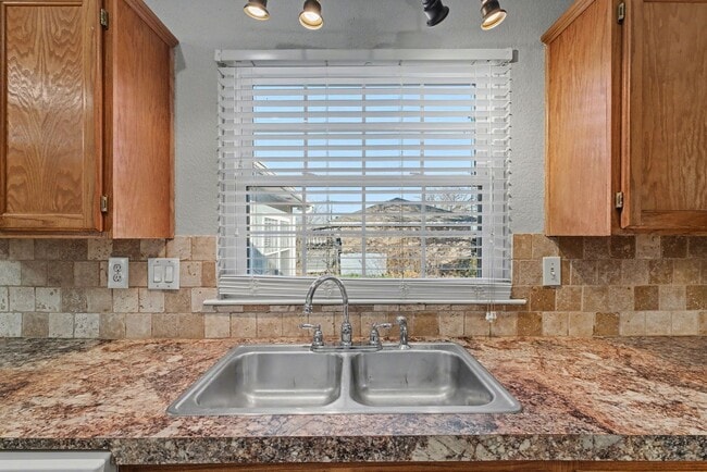 Building Photo - 3-Bed Home with Fireplace, Fenced Yard & Flexible Living Space