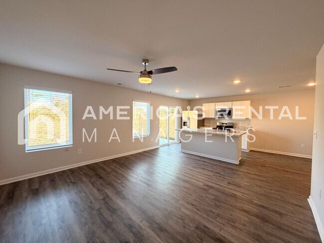 Building Photo - Spacious Two-Story Townhome with Open Layout!