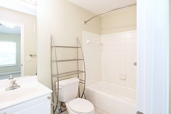 Building Photo - Student + Pet-Friendly Woodlands Condo with Community Amenities