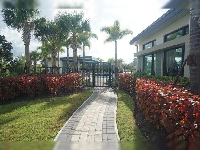 Building Photo - Stunning 5-Bedroom Lakeview Home in River Landing, Wesley Chapel