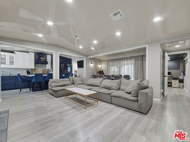 Building Photo - 6842 Ranchito Ave