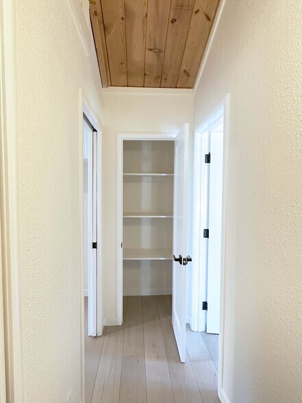 Handy linen closet to keep essentials neatly tucked away. - 4570 58th St
