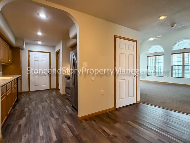 Building Photo - 2 bedroom 1.5 bath duplex with sunroom, 2 car garage and fenced yard