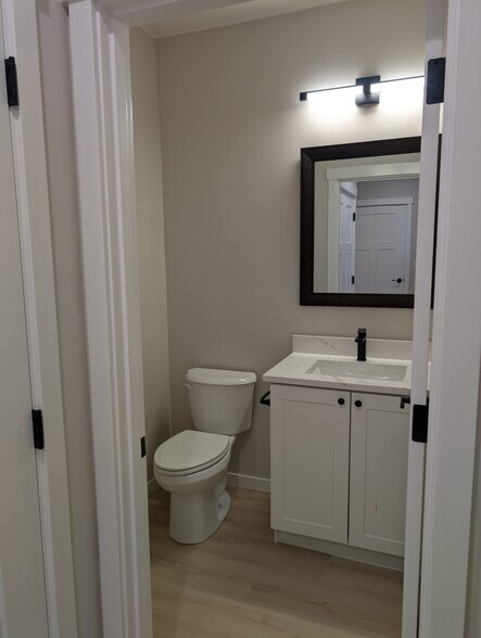 Downstairs half bath - 1983 S Alliance Country Dr