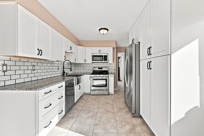 Building Photo - $2,345.95, 5-bed, 2.5-bathroom located in Colorado Springs with a fenced backyard.