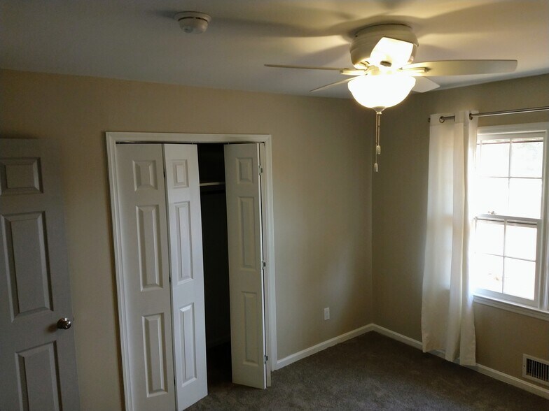 Bedroom #2 with ceiling fan - 6457 Peacock Blvd