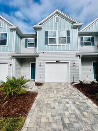 Building Photo - Lagoon Life + Luxury Living in St. Johns County - Beachwalk Townhome on the water!