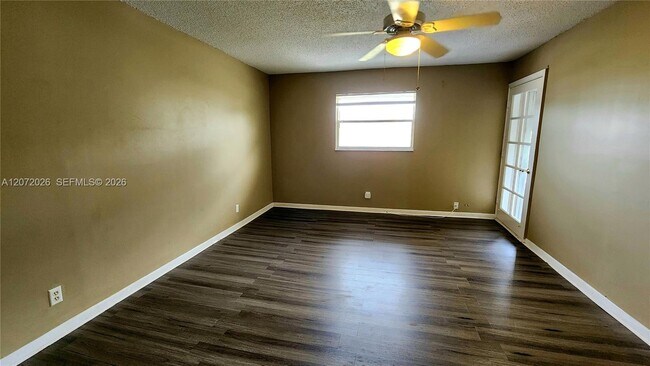 Building Photo - 2700 Coral Springs Dr
