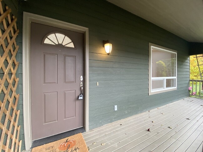 Building Photo - Spacious 4-bedroom with Panoramic Deck Nex...