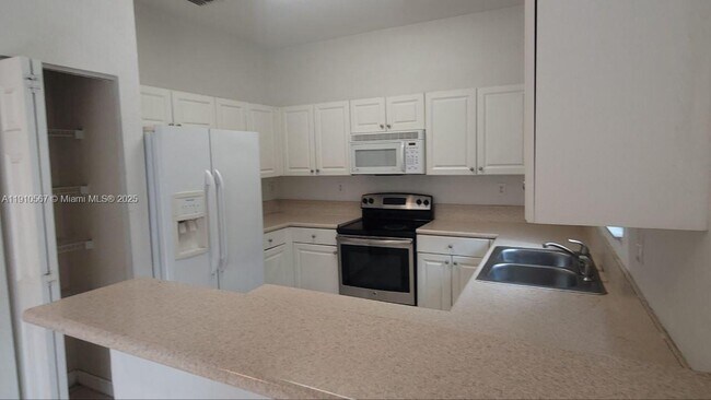 Building Photo - 12874 SW 132nd Terrace