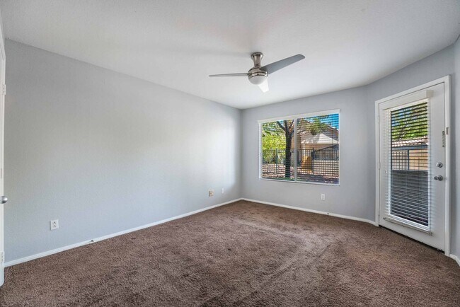 Building Photo - Introducing a beautiful and cozy condomini...