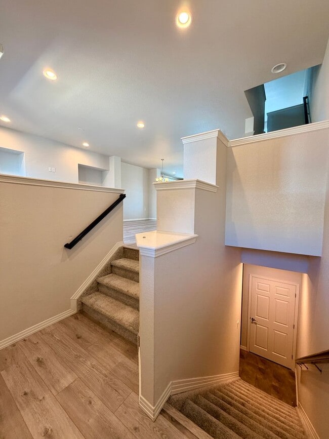 Building Photo - Move-In Ready 3-Story Townhome with Loft & 2-Car Garage