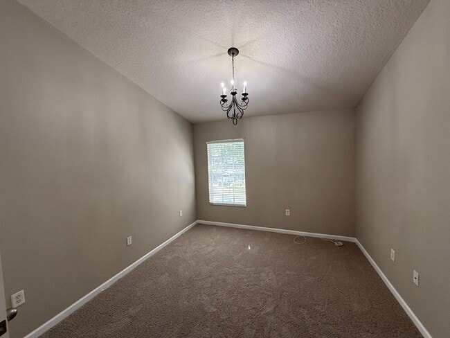 Building Photo - Beautiful home located inside gated commun...