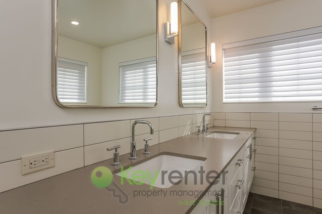 Building Photo - Spacious Living with Balconies, Deck, and Private Yard