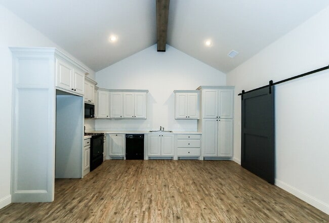 Building Photo - First Full Month's Rent Free! New Cooper M...