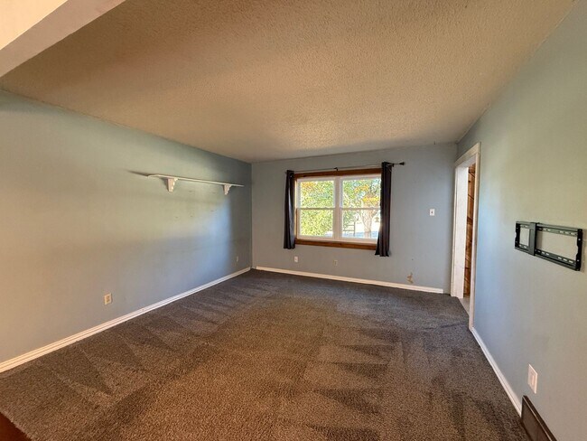 Building Photo - 4 Bed Brick Home! Zia School District! - Pets Welcome!!!