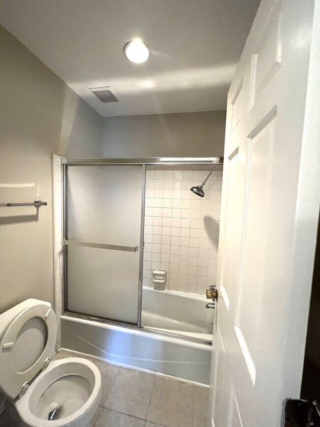 Building Photo - RENT SPECIAL! Just painted, modern gray! Charming end unit town home in Stones Throw. Walking dis...