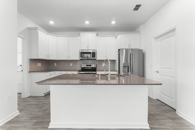 Building Photo - Available on July 10! Solar panel Spacious 3 bedroom house with all appliances included.