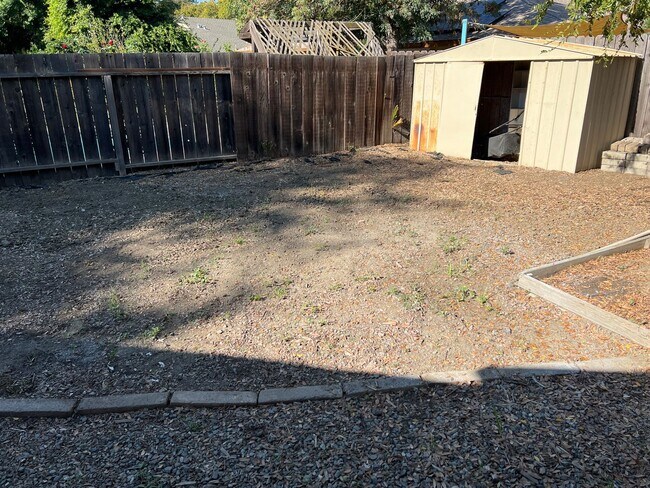 Building Photo - Four bedroom two bathroom home with a pool in Central Davis