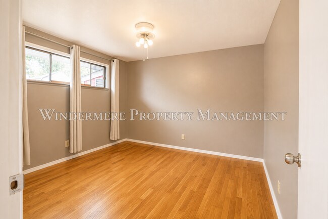 Building Photo - Three Bed Rambler on large fenced corner lot with patio