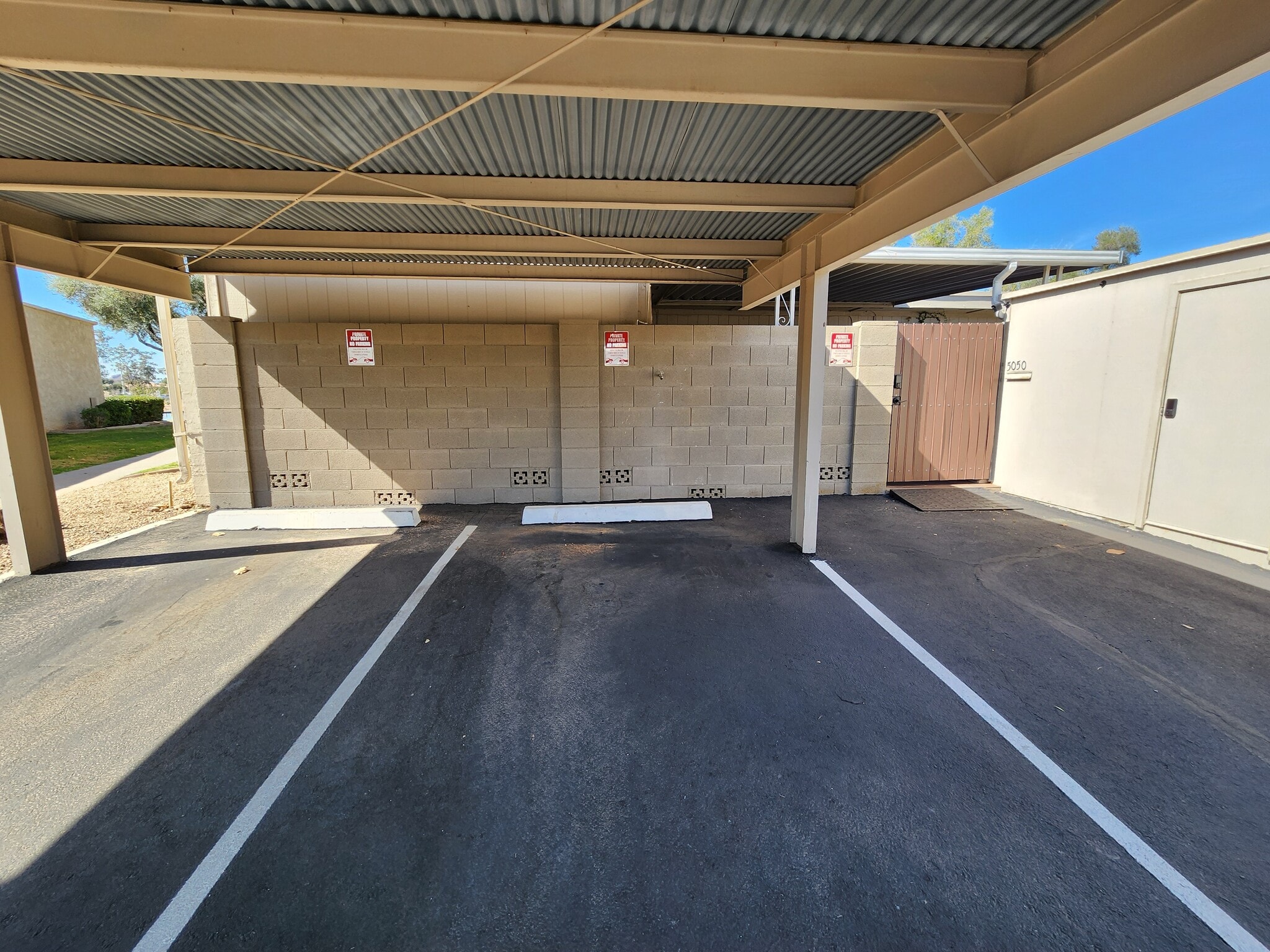 3 reserved and covered parking spaces with gate to patio. - 5050 N 81st St