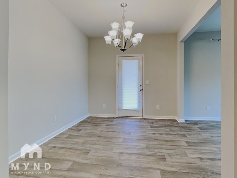 Building Photo - 8645 River Ridge Dr