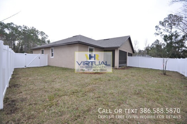 Building Photo - 3 bedroom duplex with fenced yard