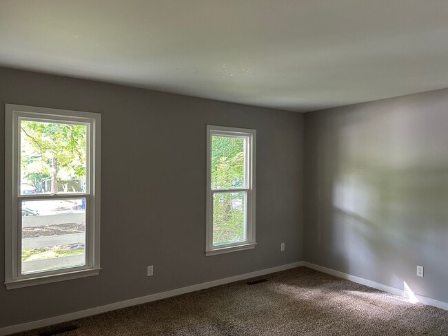 Building Photo - Charming 3BR Cape Cod w/ Loft, Skylights & Fenced Yard – Prime Midlothian Location - Buckingham V...