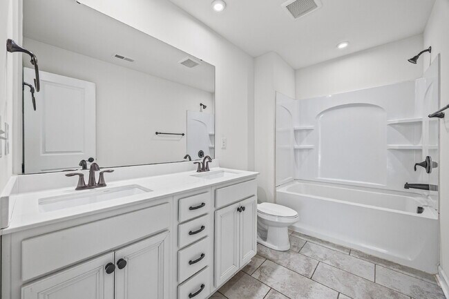 Building Photo - Classic finishes paired with an open, versatile layout!