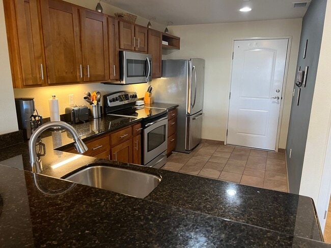Building Photo - Top-Floor Ocean View Condo Across from the Beach | Furnished 2BR + Central A/C