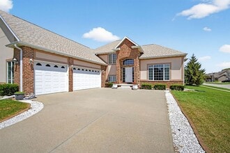 Building Photo - Spacious 5-Bed Walkout Home with Over 3,50...