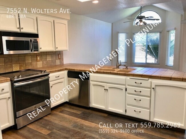 Building Photo - 7552 N Wolters Ave