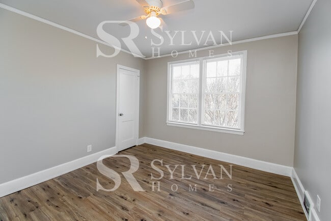 Building Photo - The living is easy in this 3 bedroom, 2 bathroom brick home