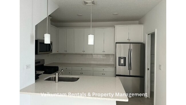 Building Photo - 563 Cherry Elm Dr