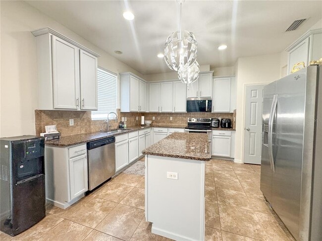 Building Photo - 5594 Angelonia Terrace