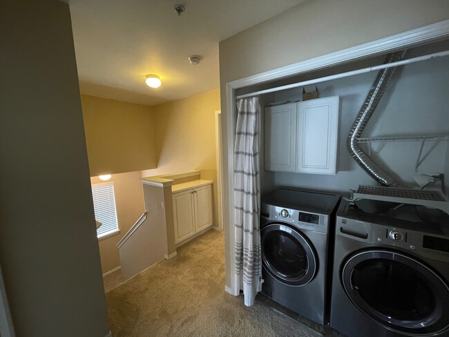 In-unit laundry at top of stairs by all bedrooms - 13400 Dumas Rd