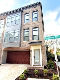 Building Photo - Brand new 4 level, 4 Bedroom Townhome with Elevator!