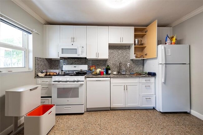 Building Photo - 5448 NE 3rd Ter.