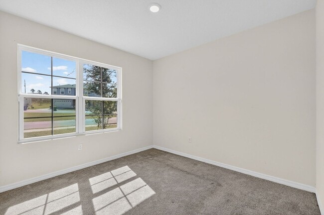 Building Photo - Available Now in Tavares | 2023 Built 4BR/2BA Home with 2-Car Garage