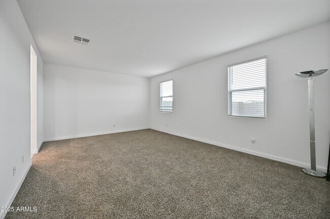 Building Photo - 38180 W Amalfi Ave