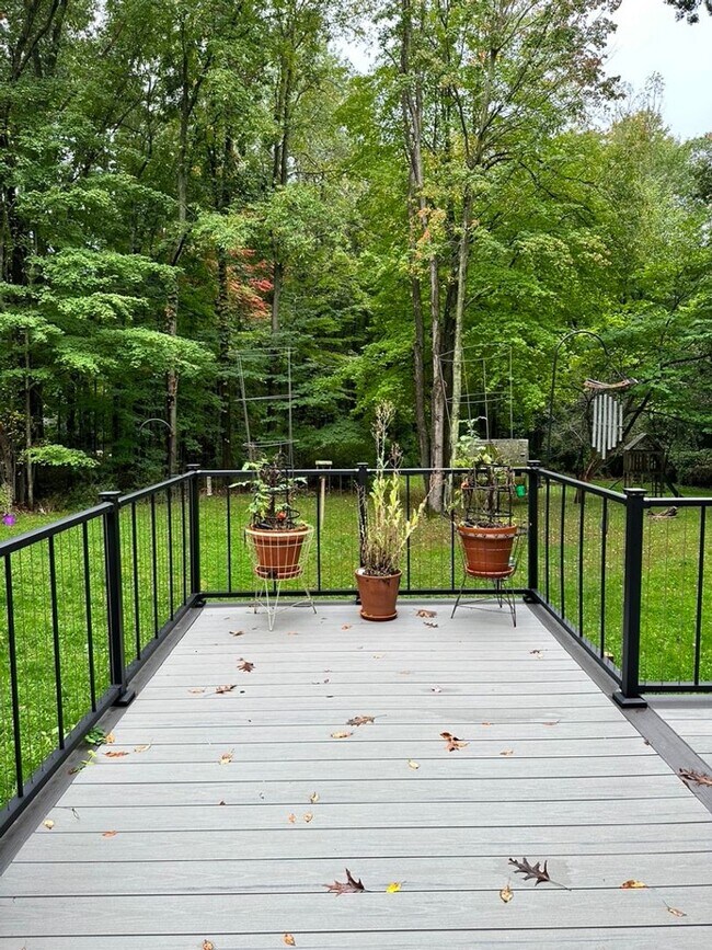 Building Photo - Dream Home in Highland, Michigan: Your Private Oasis on 5 Wooded Acres