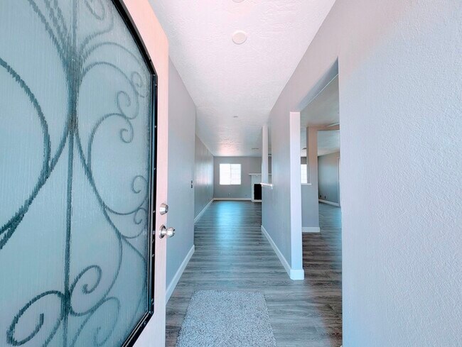 Building Photo - 4 bed with Dual master bedrooms and Solar ...