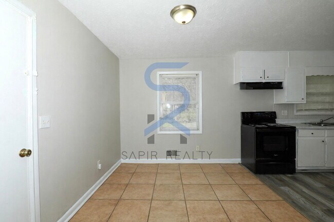 Building Photo - Timeless All-Electric Ranch Charm in a Vibrant, Peaceful Corner of South River Gardens