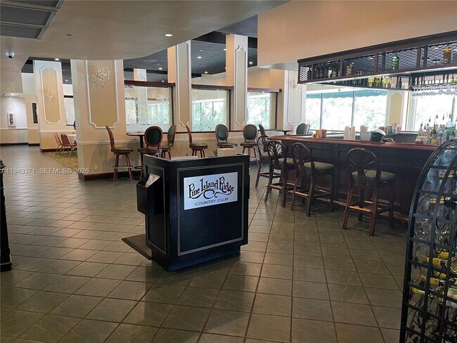 Building Photo - 1831 Sabal Palm Dr