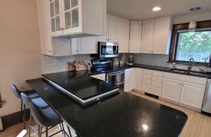 Kitchen with updated appliances - 1121 6th St S