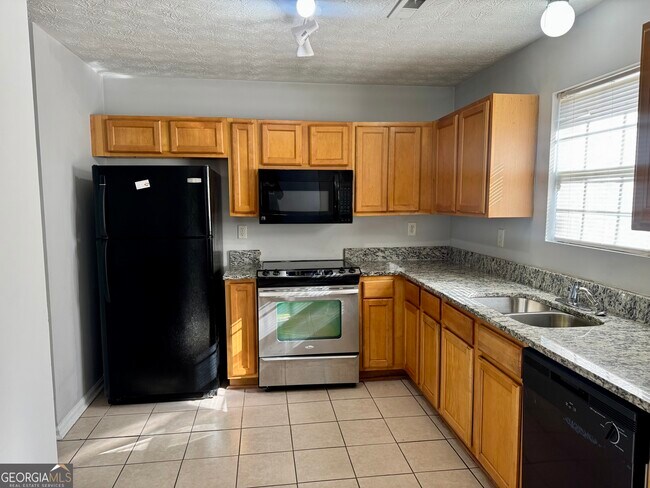 Building Photo - 5663 Windfall Ln