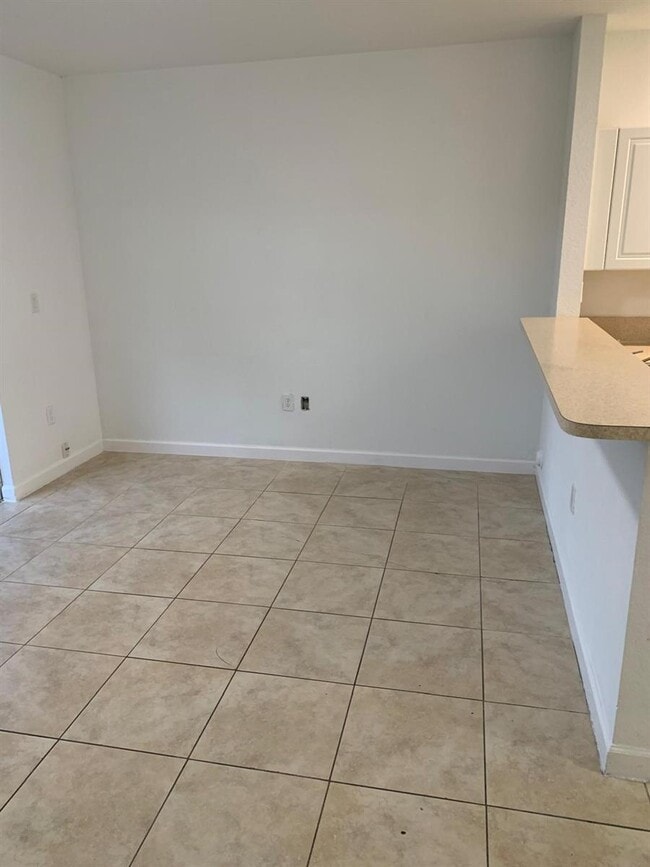 Building Photo - 3390 NE 13th Cir Dr