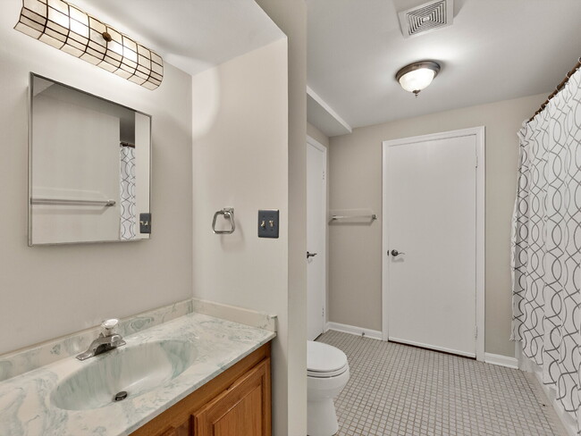 Building Photo - "Stunning 4-Bed Gem with Finished Basement...